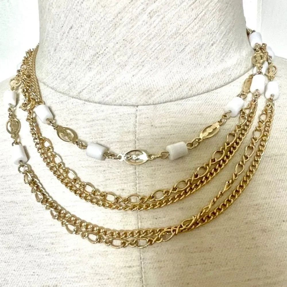 Gold tone white beaded long chain necklace